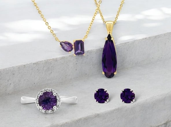Elegant amethyst jewelry set featuring a pendant, ring, and earrings on a neutral background.