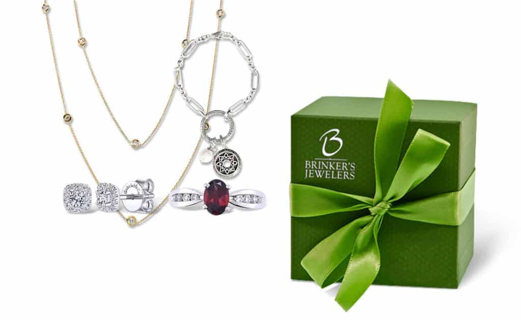 wedding anniversary gift ideas - necklace, bracelet, earrings and ring with a green Brinker's jewelry box.