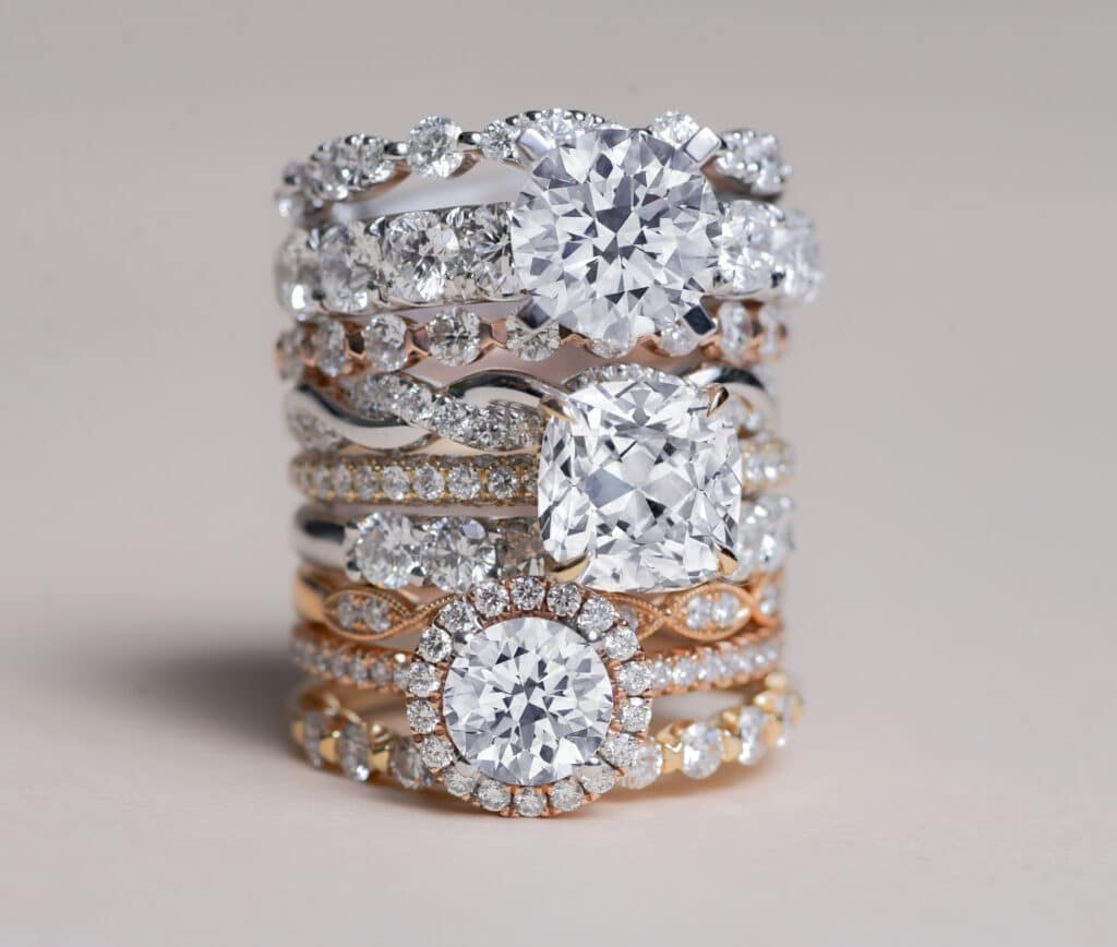 Closeup of 3 Imagine Bridal engagement rings stacked