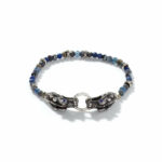 Elegant blue bead bracelet with silver dragon clasps and intricate gemstone details.