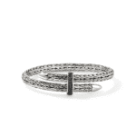 Elegant silver cuff bracelet with black gemstones, featuring a braided design for sophisticated style.