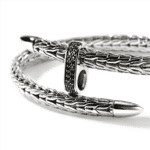 Elegant silver bracelet with black gemstones, showcasing exquisite design and craftsmanship.