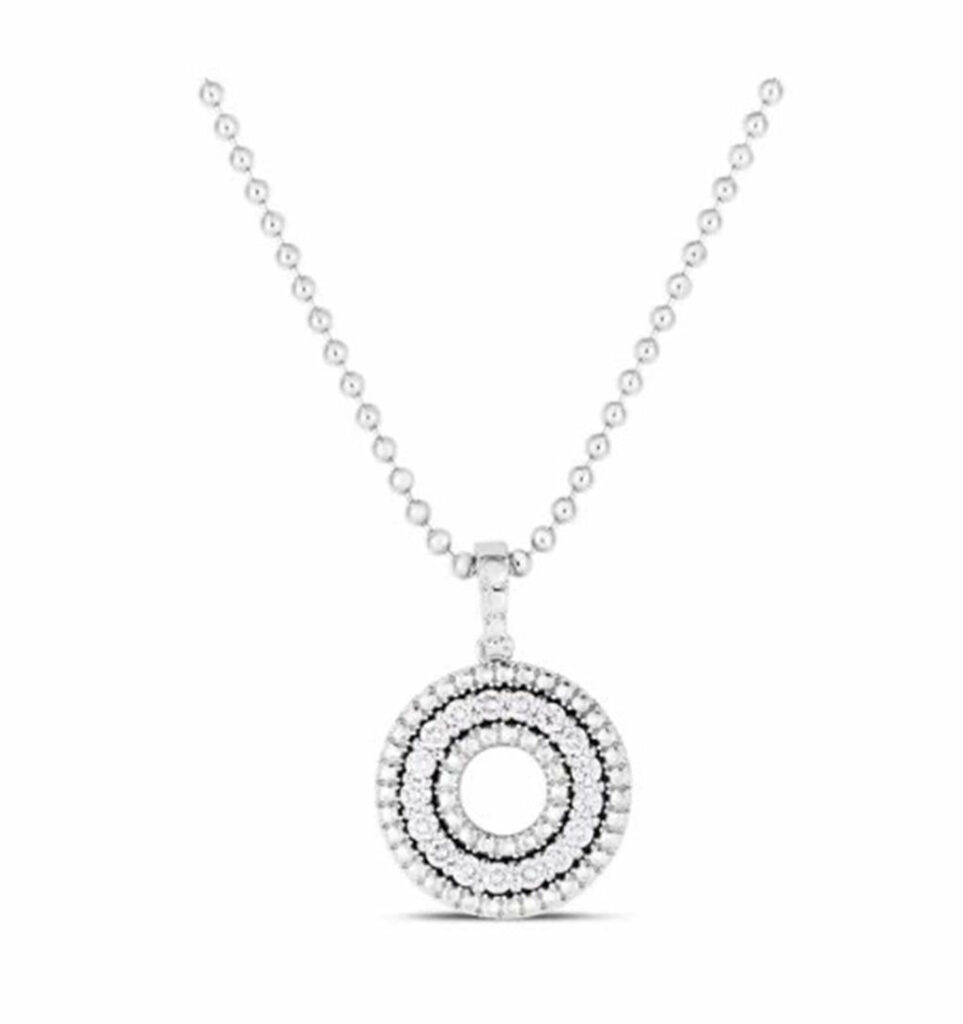 Elegant gemstone necklace with a layered pendant, perfect for any occasion.