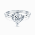 Elegant pear-shaped engagement ring with halo diamonds and polished white gold band.