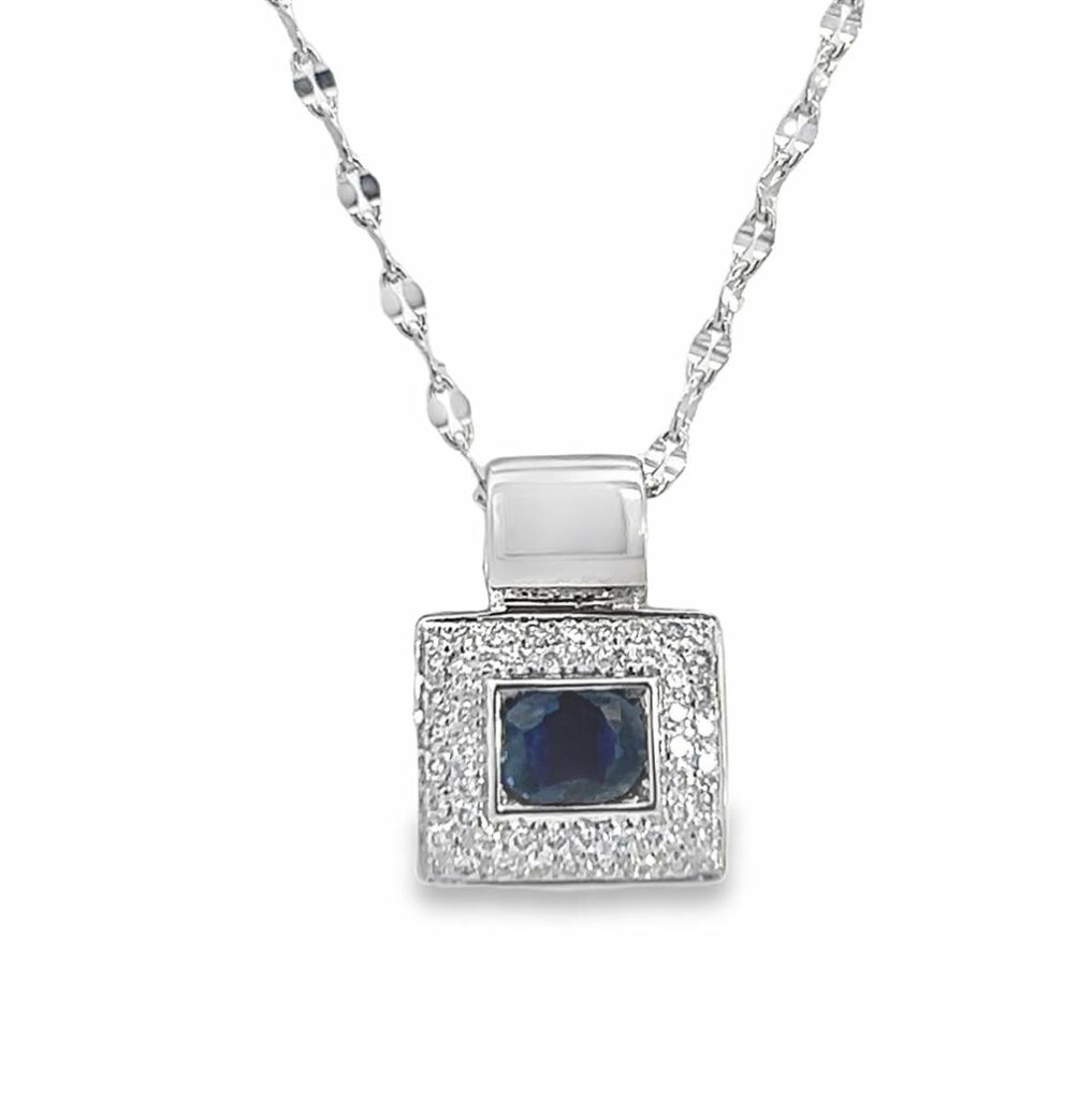Elegant blue gemstone pendant necklace with sparkling accents, perfect for any occasion.