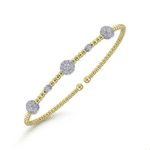 Elegant gold and silver bracelet with diamond accents, perfect for any style or occasion.