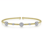 Elegant gold and silver bracelet with sparkling accents, perfect for versatile styling and modern luxury.