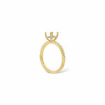 Elegant golden ring with diamond crown setting and textured band, perfect for any occasion.