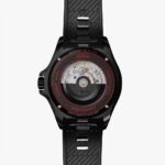Sleek black Shinola watch with exposed mechanical movement and durable ceramic bezel.