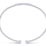 Elegant metallic bracelet with unique beads, perfect for any stylish occasion.