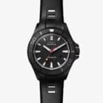 Sleek black Shinola watch with textured dial, automatic movement, and durable rubber strap.