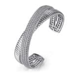 Elegant silver cuff bracelet with modern design and textured patterns, perfect for any occasion.