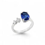 Elegant sapphire and diamond ring in white gold, perfect for engagement or special occasions.