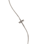 Elegant silver chain with intricate cross pendant, perfect for faith-inspired fashion statements.