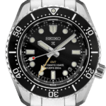Seiko divers watch with GMT function, stainless steel case, and luminescent features for underwater visibility.