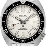 Sleek Seiko automatic divers watch with stainless steel case, luminescent dial, and 200m water resistance.