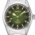 Elegant Seiko automatic watch with dark green dial, stainless steel case, and water resistance.