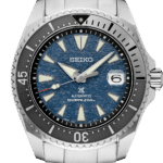 Seiko automatic divers watch featuring a blue textured dial, stainless steel case, and durable design.