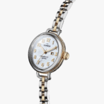 Elegant dual-tone watch with mother-of-pearl dial, Arabic numerals, and luxurious gold accents.