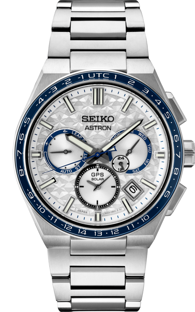 Seiko Astron watch features a silver dial, blue bezel, and solar technology for modern elegance.
