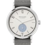 Elegant NOMOS Glashütte stainless steel watch with minimalist design, blue sub-dial, and gray strap.