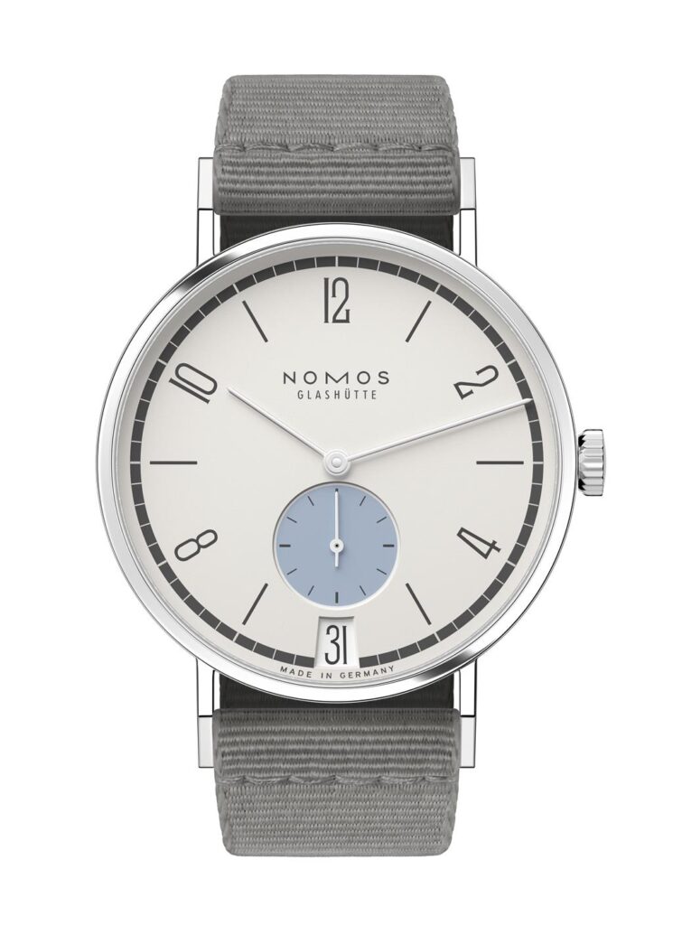 Elegant NOMOS Glashütte stainless steel watch with minimalist design, blue sub-dial, and gray strap.