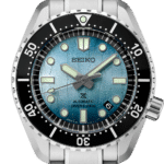 Seiko automatic divers watch with blue gradient dial, 200m water resistance, and stainless steel bracelet.