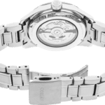 Stainless steel Seiko watch with transparent case back and elegant bracelet design.
