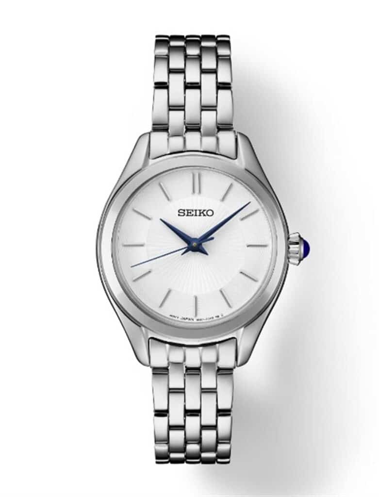 Elegant Seiko wristwatch with a polished silver finish and stylish blue hands.