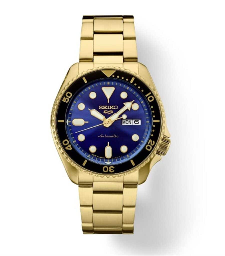 Stylish Seiko automatic watch with blue dial, gold case, and elegant bracelet for any occasion.