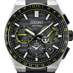 Seiko Astron watch with black dial, luminous features, and stainless steel bracelet.