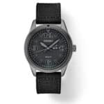 Stylish Seiko sport watch with black design, luminous dial, and durable fabric strap.