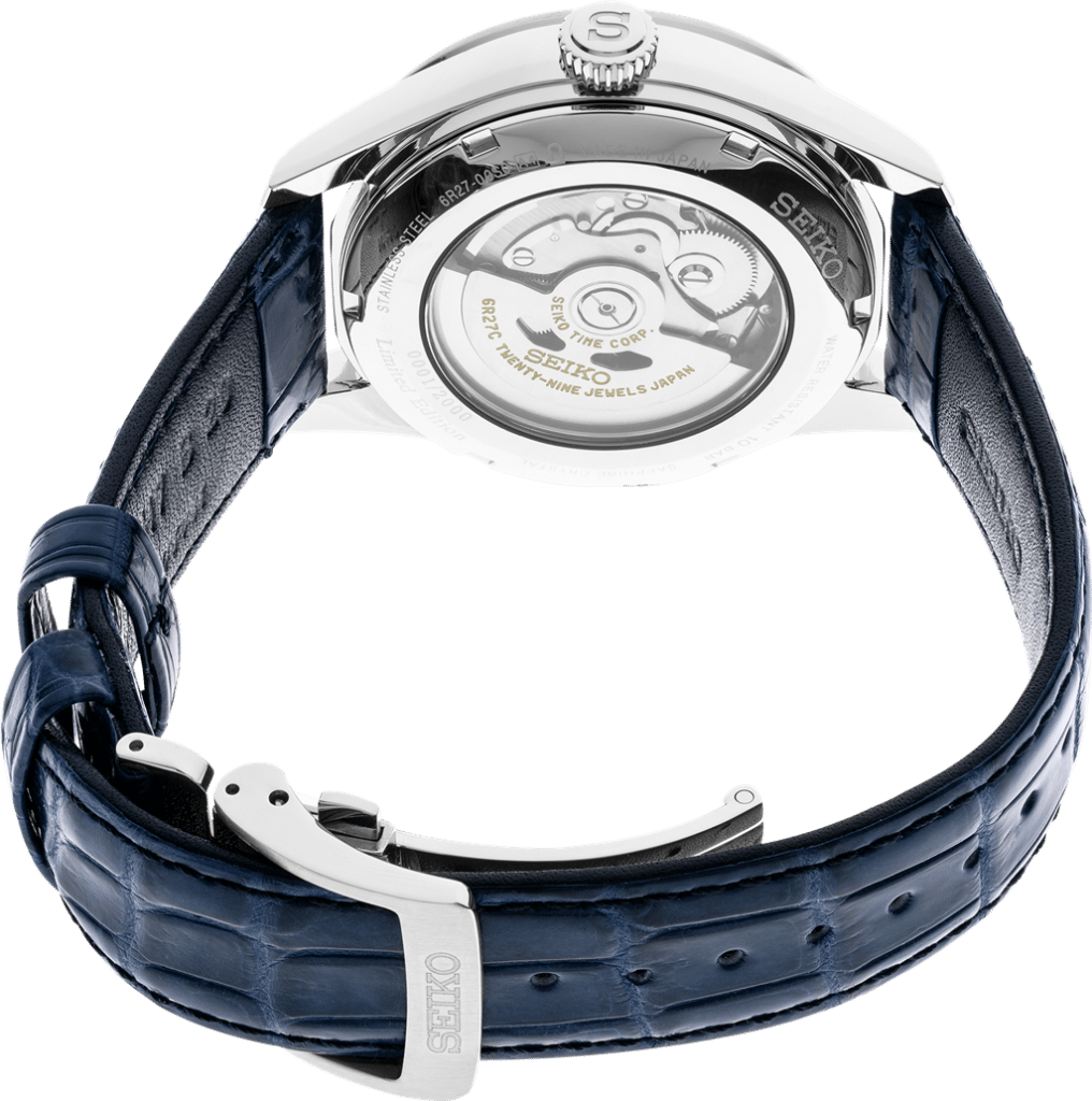 Seiko automatic watch with transparent case back, showcasing intricate movement and luxurious leather strap.