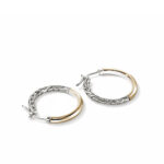 Elegant gold and silver hoop earrings with unique woven chain design for versatile style.