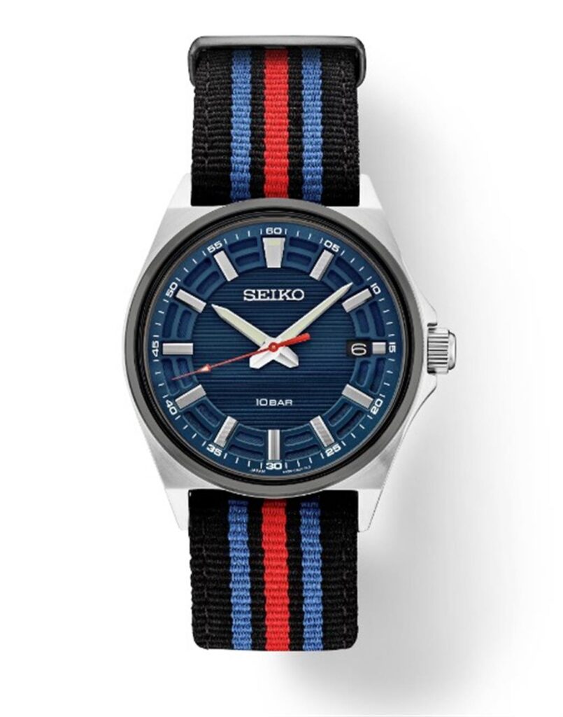 Stylish Seiko watch with blue dial, stainless steel case, and vibrant fabric strap.