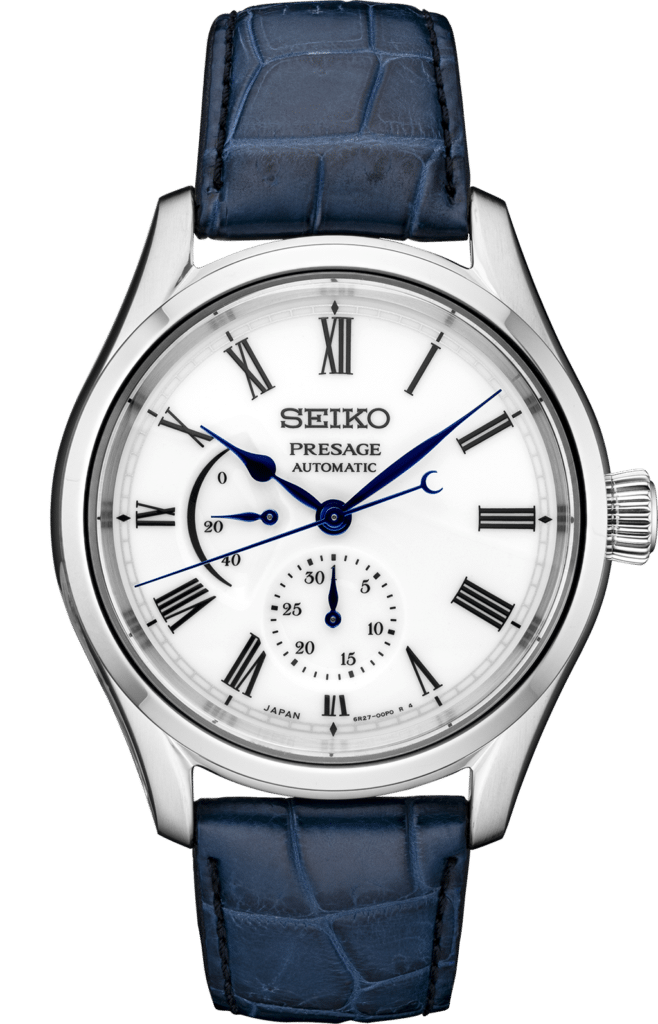 Elegant Seiko Presage watch with blue accents, Roman numerals, and luxurious leather strap.