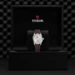 Luxurious Tudor watch in elegant presentation box showcasing exquisite craftsmanship and timeless design.