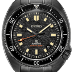 Elegant Seiko dive watch with black stainless steel and luminous features for underwater adventures.