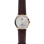 Sophisticated Tudor watch with stainless steel case, rose gold accents, and brown leather strap.