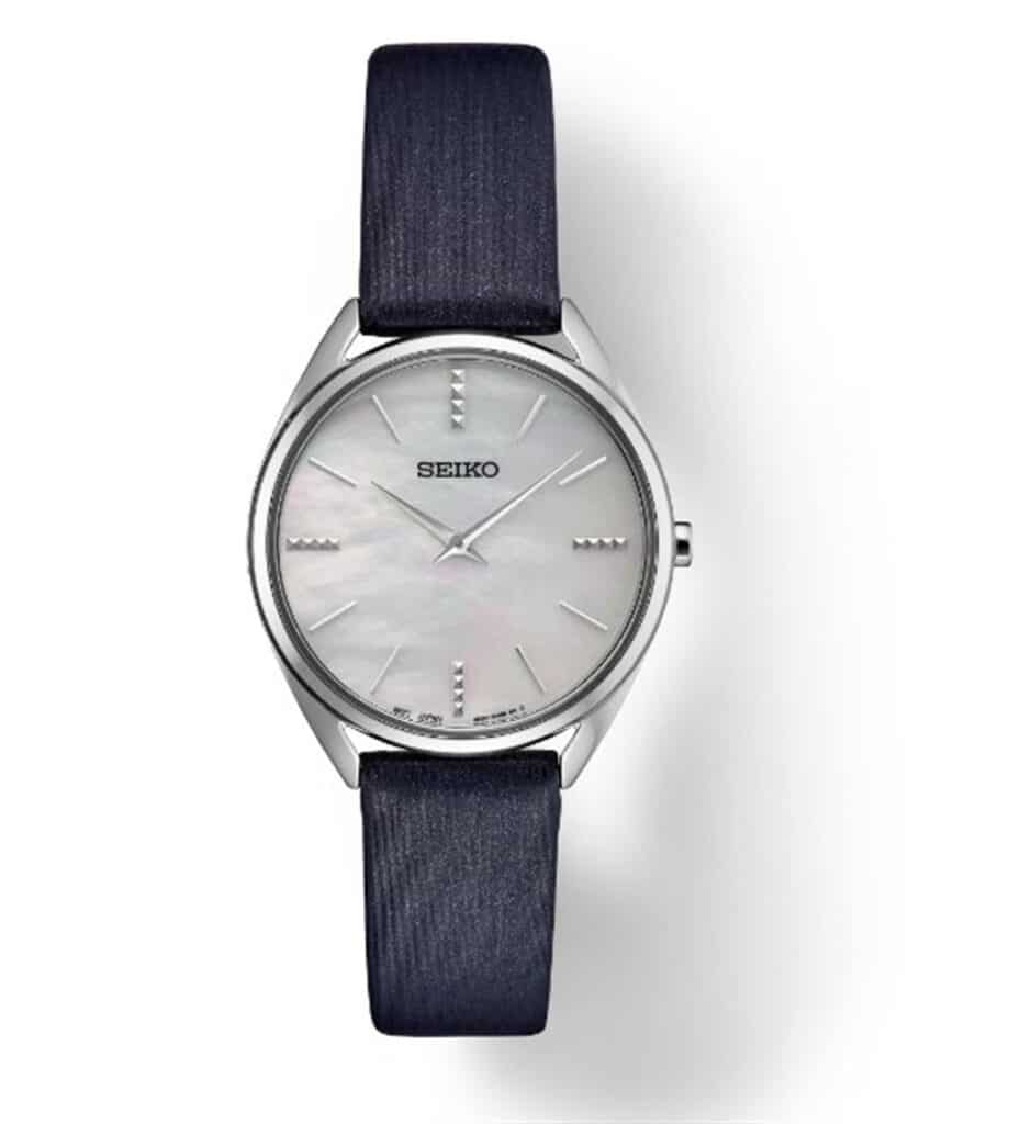 Elegant Seiko watch with mother-of-pearl dial and blue fabric strap, perfect for any occasion.