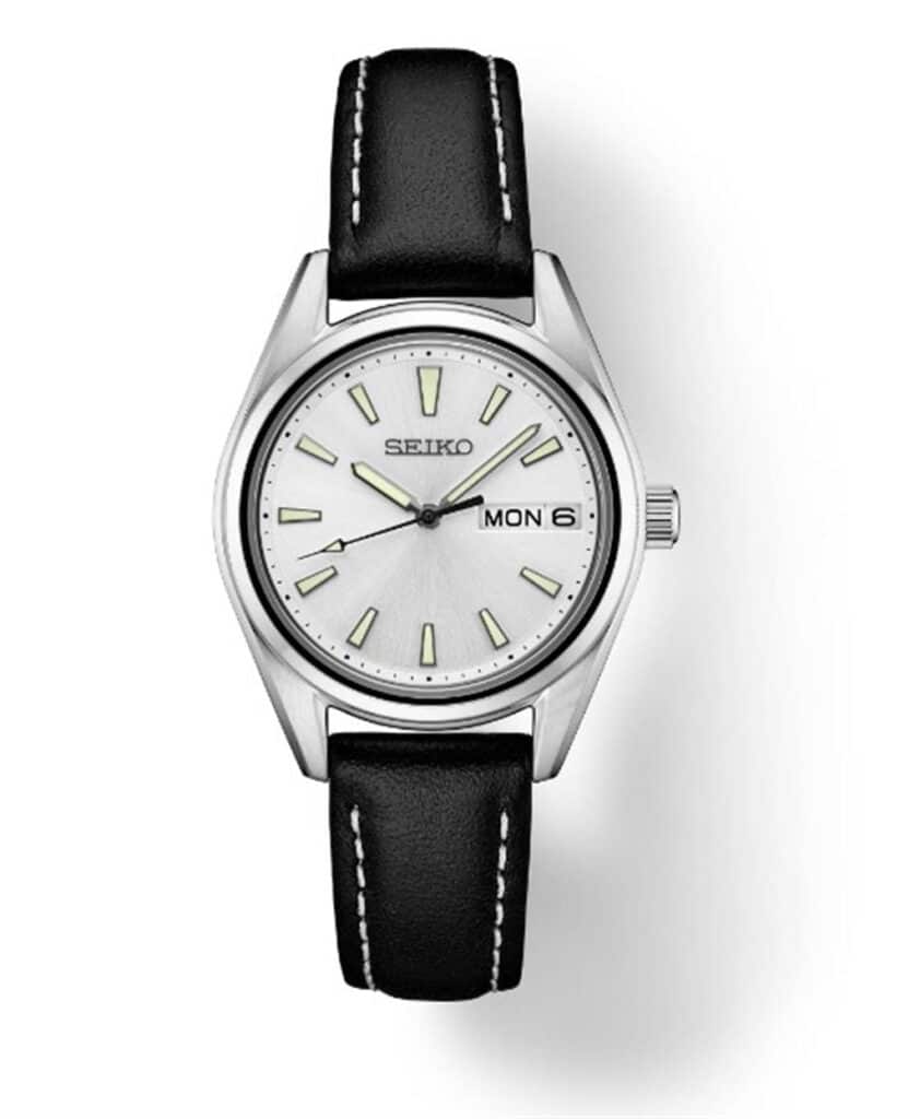 Elegant Seiko watch with silver dial, stainless steel case, and black leather strap.