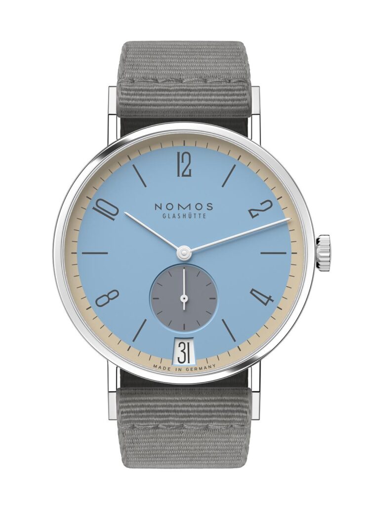 Elegant NOMOS Glashütte wristwatch with blue dial, stainless steel case, and gray strap.