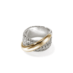 Intricate silver and gold ring with textured design, perfect statement jewelry for any occasion.