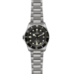 Tudor dive watch with black dial, luminous markers, rotating bezel, and stainless steel bracelet.