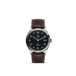 Elegant Tudor watch with black dial, silver hands, and brown leather strap.