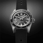 Seiko diver’s watch with stylish stainless steel case, luminous dial, and robust rubber strap.