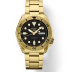 Luxury Seiko automatic watch with gold tone stainless steel bracelet and elegant black dial.