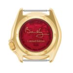 Limited edition SEIKO watch with a vibrant red dial and Brian Mays signature in gold.
