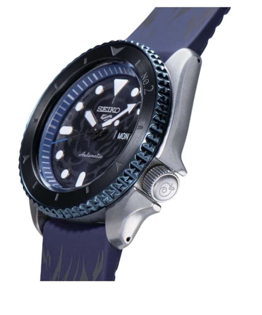Stylish Seiko automatic watch with blue bezel, black dial, and navy silicone strap.