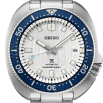 Stylish Seiko diving watch features a stainless steel body, blue bezel, and luminous markers.